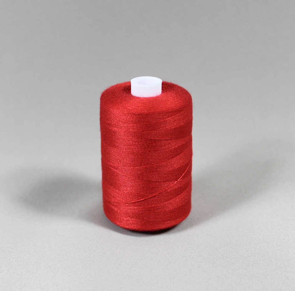 Röd stark polyester sytråd (bild 1 av 3)