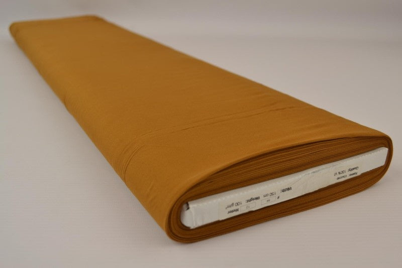 Mörk ockragul viskostyg – lätt fall & elegant matt glans (bild 2 av 4)