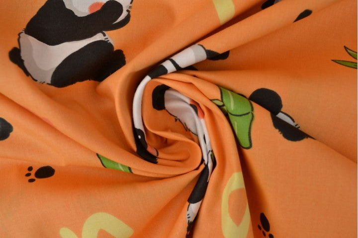 Orange bomullspoplin med pandatryck – barn (bild 3 av 3)