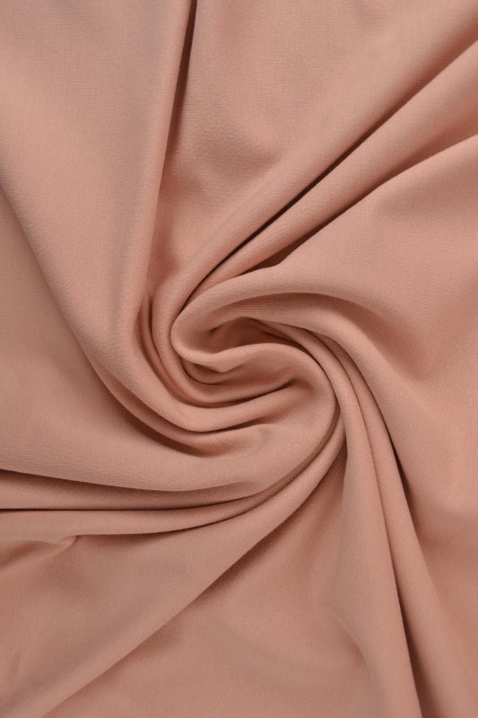 Dammig rosa french terry – mjuk bomullsstickad metervara med stretch (bild 1 av 5)
