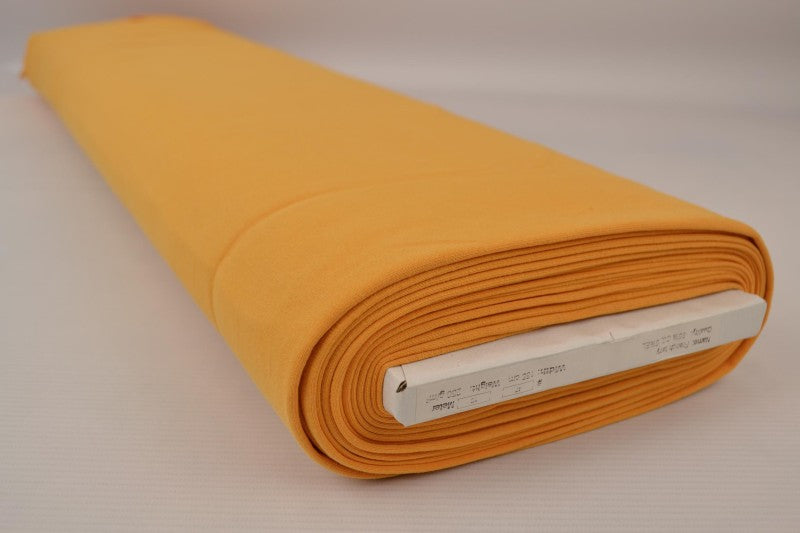 Ockragul french terry – mjuk bomullsstickad metervara med stretch (bild 2 av 5)