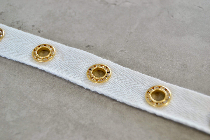 Vit band med guldringar 20mm (bild 3 av 3)