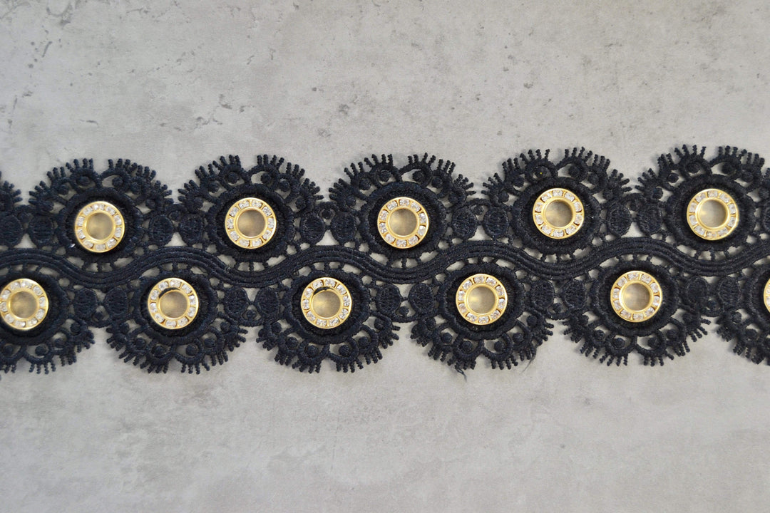 Svart blomsterband med guldringar 55mm (bild 1 av 2)