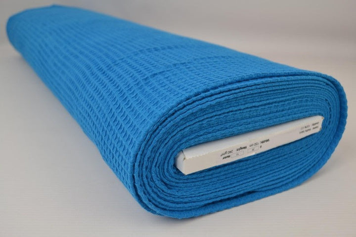 PETROLEUMSBLÅ VÅFFEL PIQUÉ – ABSORBERANDE & SNABBTORKANDE