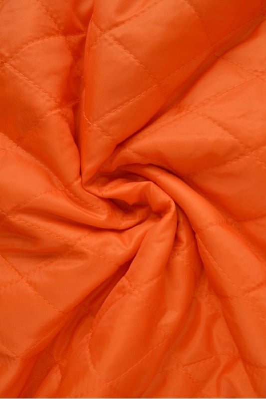Orange quiltat tyg med vadderad baksida (bild 1 av 9)