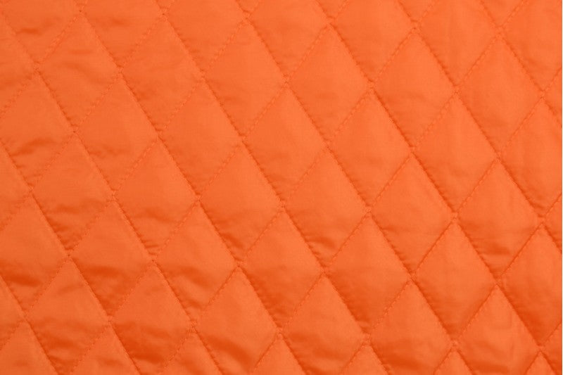 Orange quiltat tyg med vadderad baksida (bild 3 av 9)