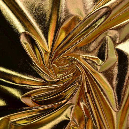 Guldfärgat lamétyg med stretch – metallic glittertyg (bild 1 av 3)