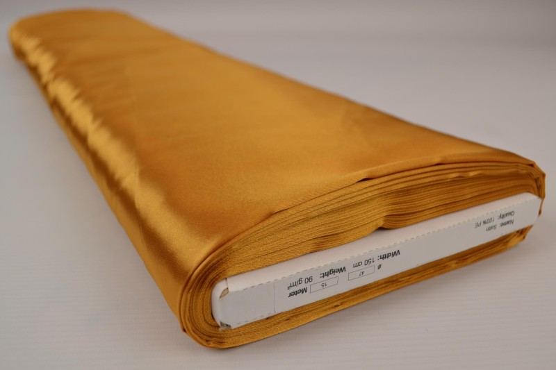 Solgul/guld satin tyg – lätt & glansigt (bild 2 av 8)