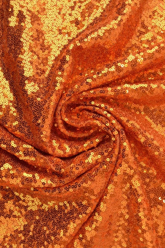 Orange paljettyg – små 3–4 mm paljetter & envägsstretch (bild 1 av 5)