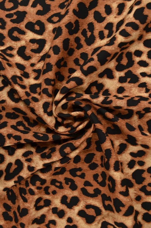 Cognac & svart viscosetyg med leopardtryck (bild 1 av 9)
