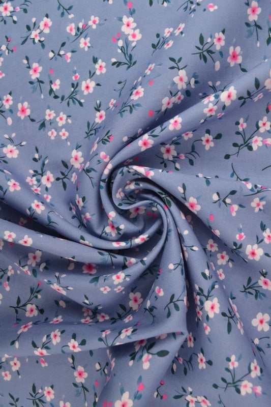 Ljusblått & rosa viscosetyg med smått blommtryck (bild 1 av 9)