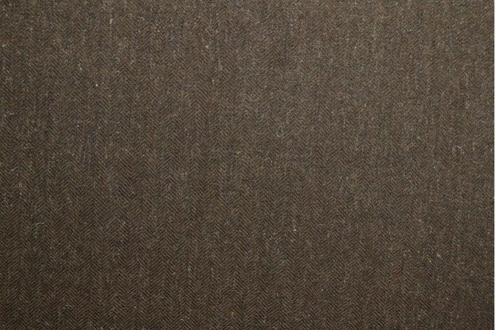Brun ull/polyester tyg med tweedstruktur och sillbensmönster (bild 3 av 3)