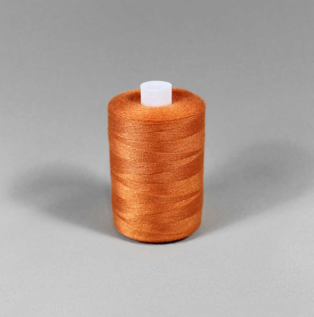 Orange stark polyester sytråd (bild 1 av 3)