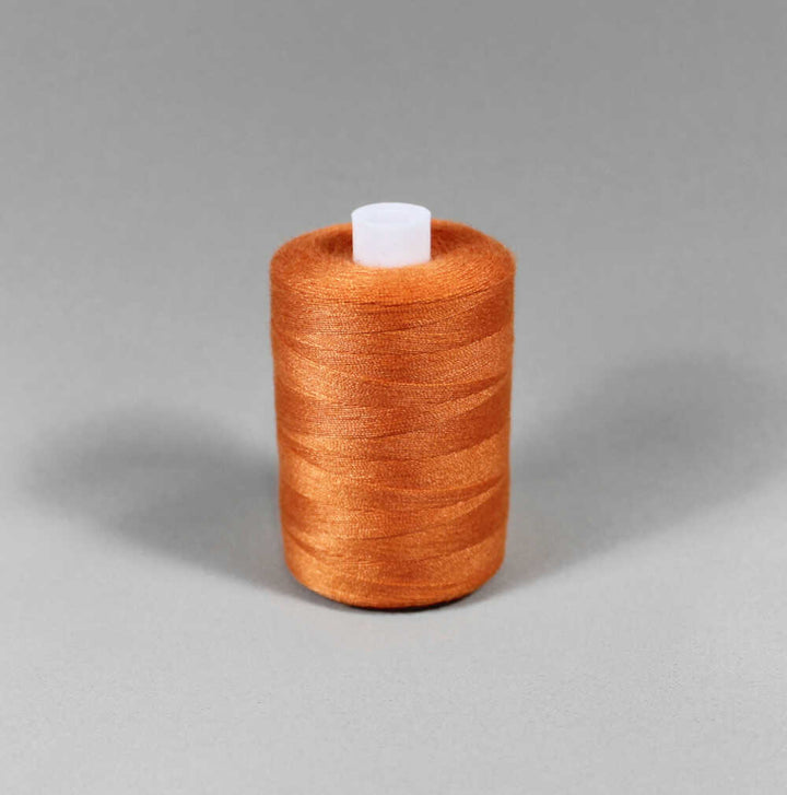 Orange stark polyester sytråd (bild 1 av 3)