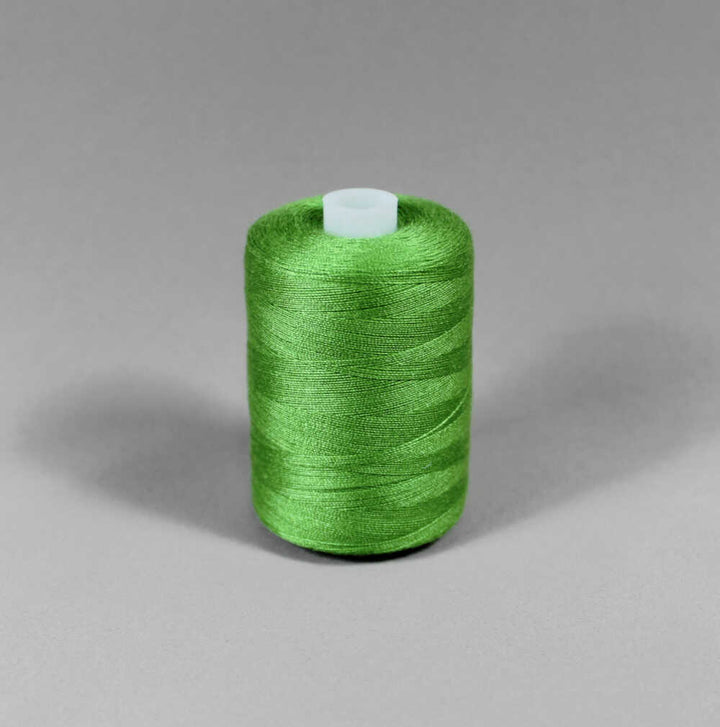 Grön stark polyester sytråd (bild 1 av 3)