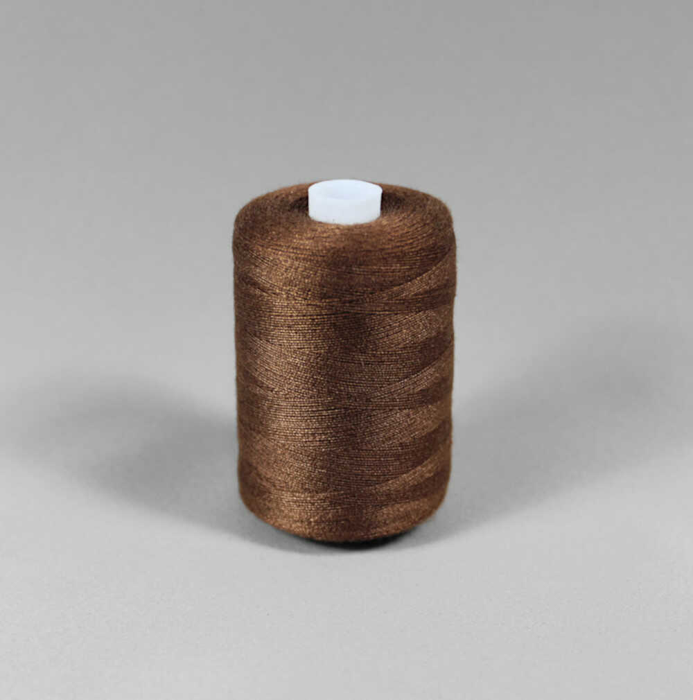 Brun stark polyester sytråd (bild 1 av 3)